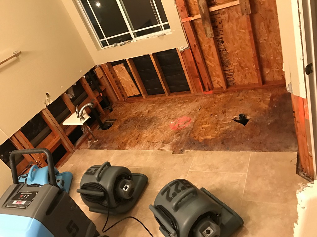 Drying Kitchen Floor - Mission Water Damage Restoration - San Diego, CA